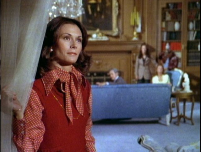 Sabrina stares out window