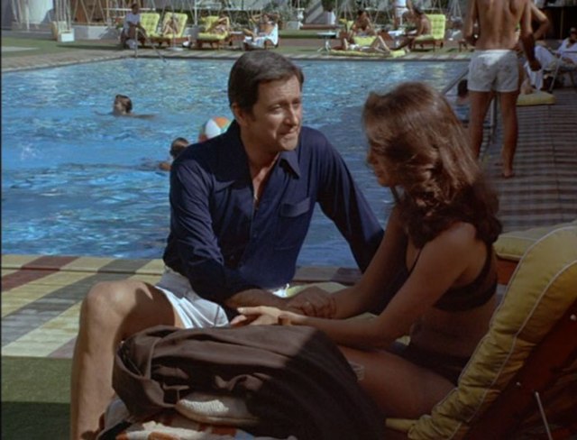 Bartone and Kelly by the pool