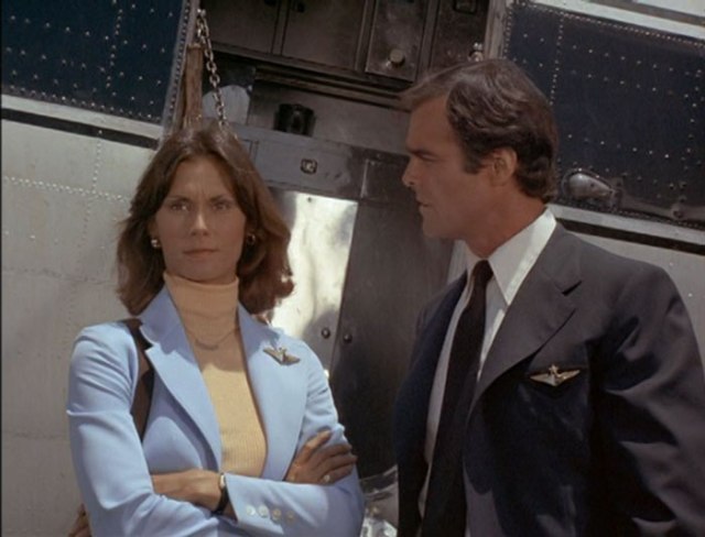 Sabrina and Jim outside the plane