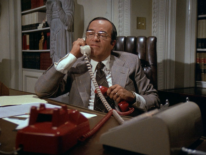 Bosley juggles the phones